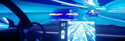 Vehicle interior dashboard with a display showing the car’s proximity to other vehicles on the road.