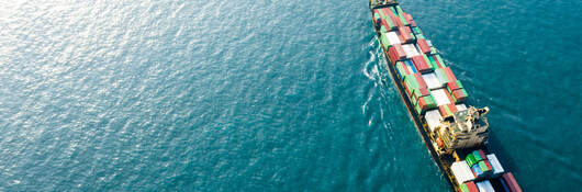 A loaded container ship in the ocean