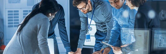 A team working around a table