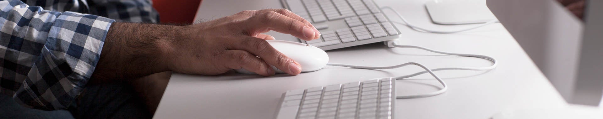 People using computers at desk