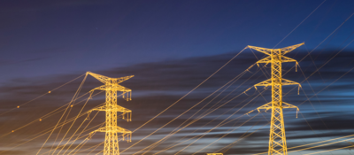 Electricity pylons at sunset